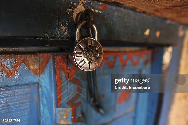 Village house sits locked as it's occupiers have left to find water in Beed district, Maharashtra, India, on Friday, April 15, 2016. Hundreds of...