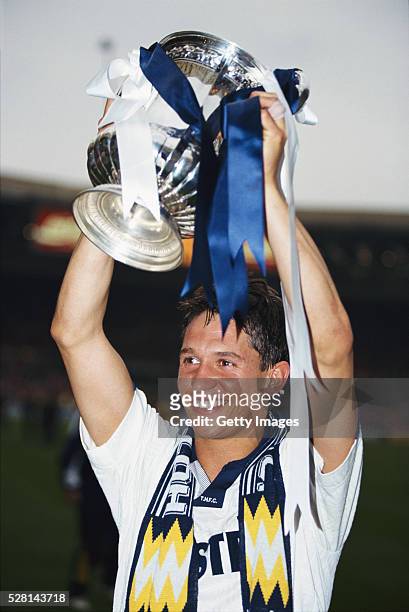 Tottenham striker Gary Lineker holds the trophy aloft after the 1991 FA Cup Final between Tottenham Hotspur and Nottingham Forest at Wembley Stadium...