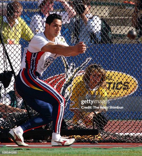 Koji Murofushi of Japan competes in the Men's Hammer Throw during the IAAF World Championships at the Commonwealth Stadium on August 5, 2001 in...