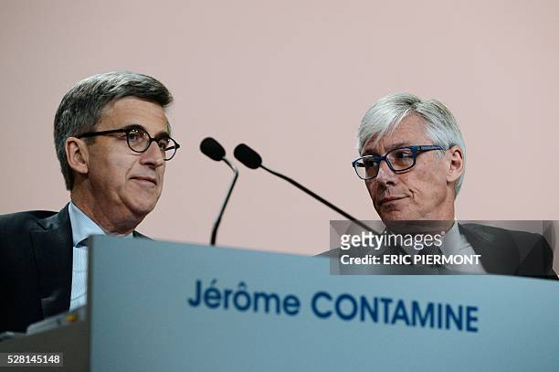 French drugmaker Sanofi chief executive officer Olivier Brandicourt and chief financial officer Jerome Contamine attend the pharmaceutical group's...