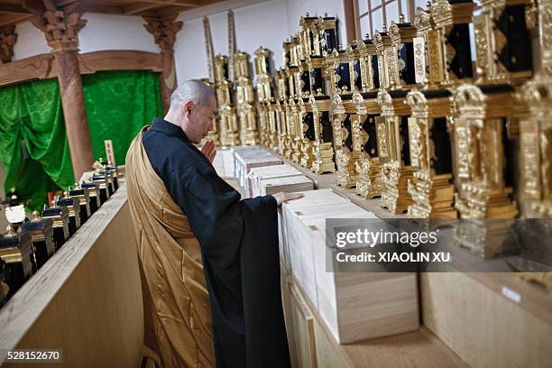 February 29 Kichijoji Temple Kaisando Hall, Kirikiri, Otsuchi, Iwate, Japan. In the morning, president Hidego Takahashi chants for dead souls of...