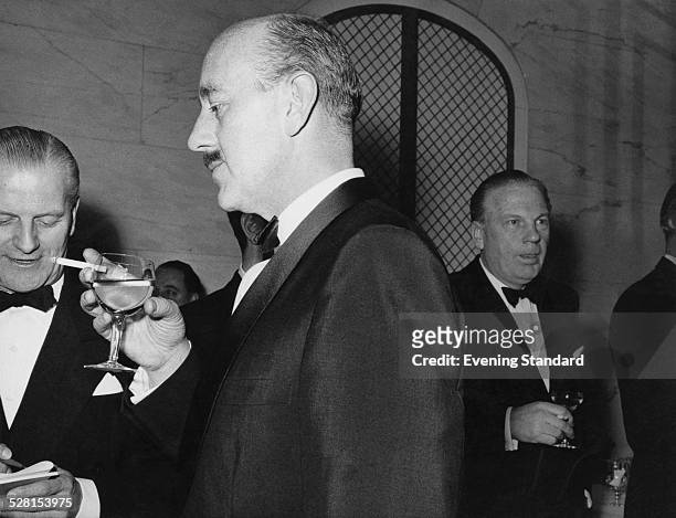 English actor Alec Guinness at the Evening Standard theatre awards, London, 26th January 1960.