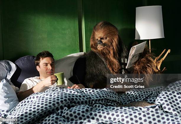 Actor Jimmy Fallon lies in bed with Chewbacca during filming for a promo for the 2005 MTV Movie Awards at Paris Studios May 12, 2005 in Queens...