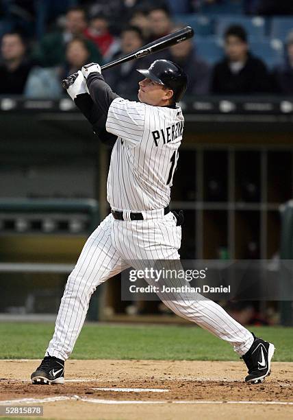 Pierzynski of the Chicago White Sox hits a solo home run in the second inning against the Baltimore Orioles on May 12, 2005 at U.S. Cellular Field in...