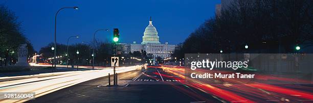 light trails near u.s. capitol building - capitol building washington dc stock pictures, royalty-free photos & images