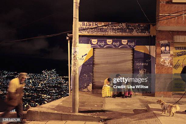 Family waiting for the bus in El Alto, Bolivia and January 26, 2010. The city of El Alto, outside Bolivia's capital La Paz, is home to some one...