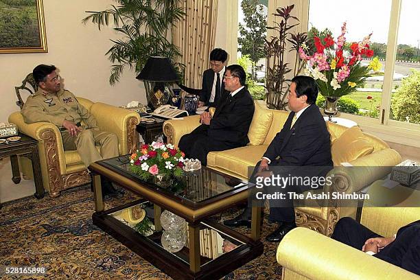 Pakistani President Pervez Musharraf meets with Japanese veteran lawmakers Taku Yamazaki, Tetsuzo Fuyushiba and Toshihiro Nikai on November 3, 2001...