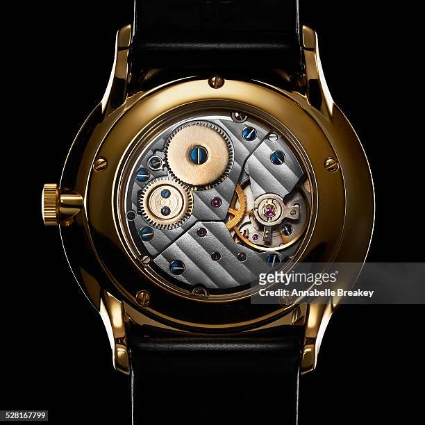 back of watch mechanism close up - watch timepiece 個照片及圖片檔