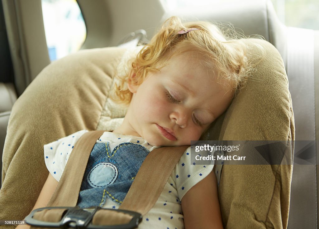 Toddler sleeping in Car