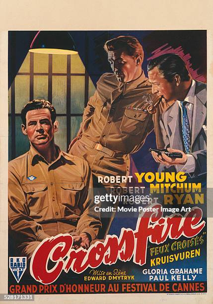 French poster for Edward Dmytryk's 1947 crime film 'Crossfire' starring Robert Young, Robert Mitchum, and Robert Ryan.