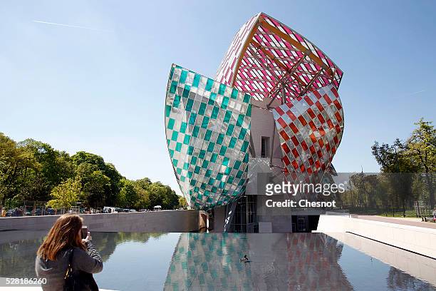 View of the Foundation Louis Vuitton covered by an temporary art work entitled 'Observatory of Light, Work in Situ' by French artist Daniel Buren on...