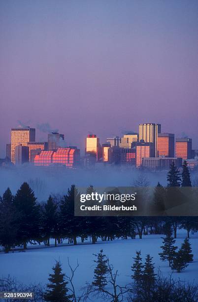 city rising from the mist - edmonton sunset stock pictures, royalty-free photos & images