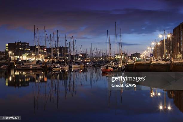 night falling over the marina of scheveningen - scheveningen bildbanksfoton och bilder