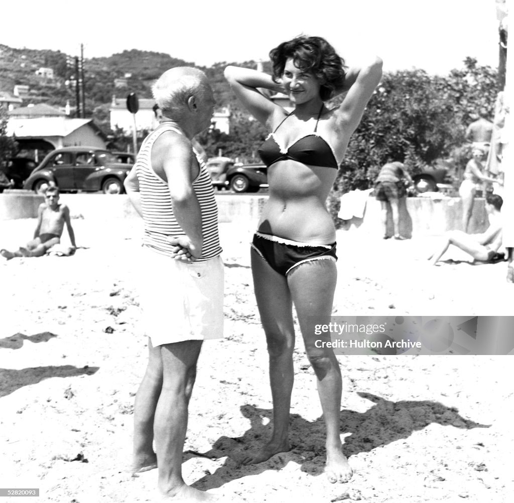 Picasso And Bikini-Clad Woman On The Beach