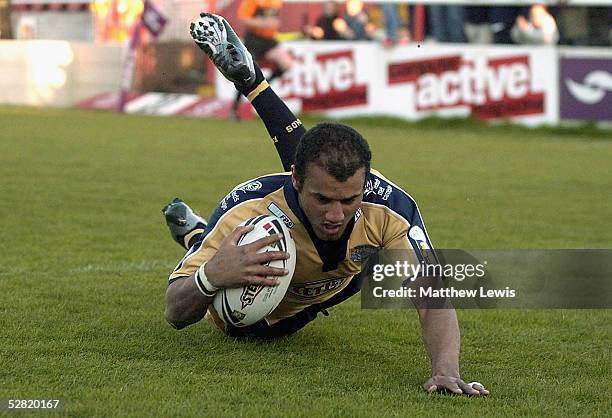 Mark Calderwood of Leeds scores a try during the Engage Super League match between Leigh Centurions and Leeds Rhinos at the Coliseum Stadium on May...