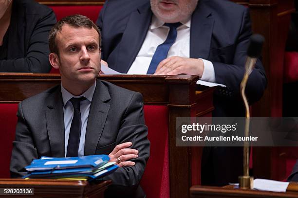 French Minister of Economy, Emmanuel Macron reacts during the weekly questions to the government at French National Assembly on May 04, 2016 in...