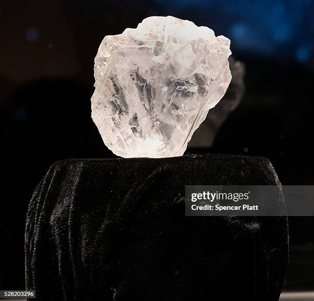 The 1109-carat rough Lesedi La Rona diamond, the biggest rough diamond discovered in more than a century, sits in a display case at Sotheby's on May...