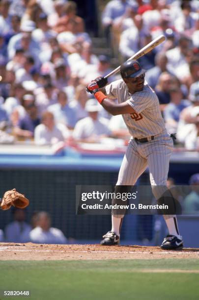 Joe Carter of the San Diego Padres waits for the pitch during an April 1990 game.