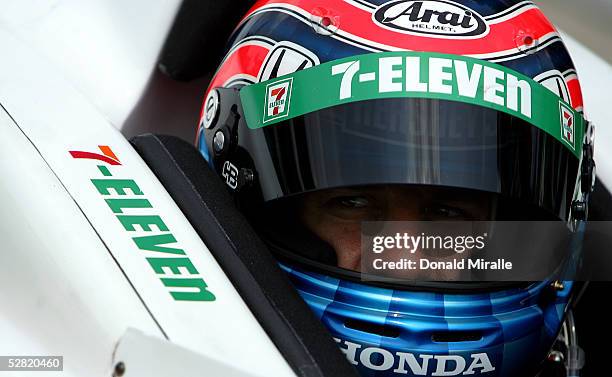 Tony Kanaan, driver of the Team 7-Eleven Andretti Green Racing Dallara Honda, readies himself for practice for the 89th Indianapolis 500-Mile Race at...