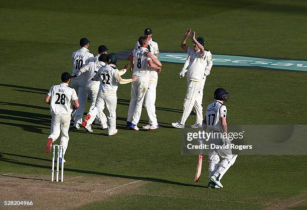 Nottinghamshire players celebrate after Steven Patterson is caught LBW off the bowling of Stuart Broad during the Specsavers County Championship...