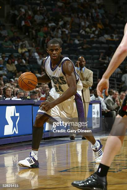 Desmond Mason of the Milwaukee Bucks drives against the Toronto Raptors during the game on April 19, 2005 at the Bradley Center in Milwaukee,...