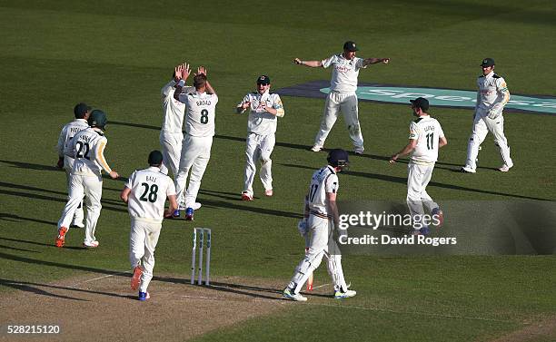 Nottinghamshire players celebrate after Steven Patterson is trapped LBW off the bowling of Stuart Broad during the Specsavers County Championship...