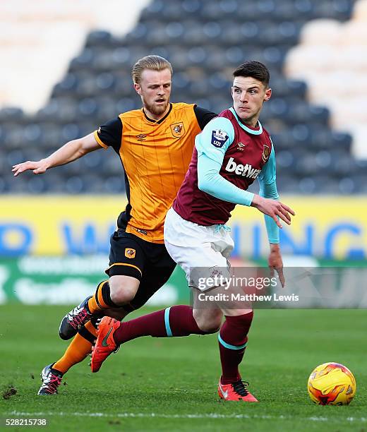Max Clarke of Hull and Declan Rice of West Ham challenge for the ball during the Second Leg of the Premier League U21 Cup Final at the KC Stadium on...