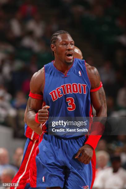 Ben Wallace of the Detroit Pistons celebrates during the game against the Charlotte Bobcats at Charlotte Coliseum on April 20, 2005 in Charlotte,...