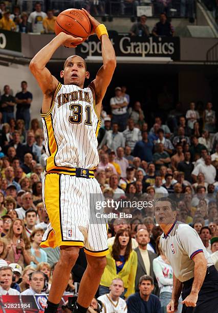 Reggie Miller of the Indiana Pacers takes the last shot of the game against the Detroit Pacers in Game three of the Eastern Conference Semifinals...