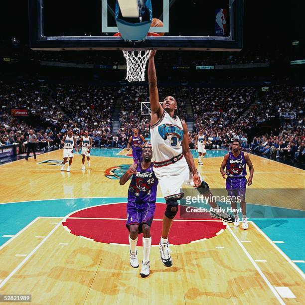 Shareef Abdur Rahim of the Vancouver Grizzlies goes for a layup against the Toronto Raptors during the NBA game on January 19, 1997 in Vancouver,...