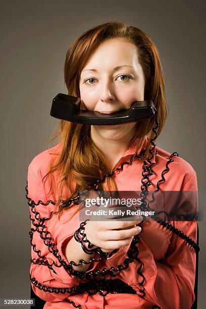 woman wrapped and gagged by phone - gagged stock pictures, royalty-free photos & images