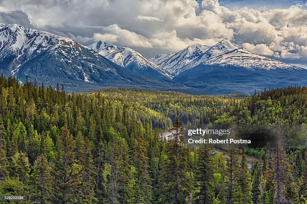 A viewpoint along the Stewart Cassiar Highway shows the Coast Mountains which form part of the Rocky Mountains; British Columbia, Canada