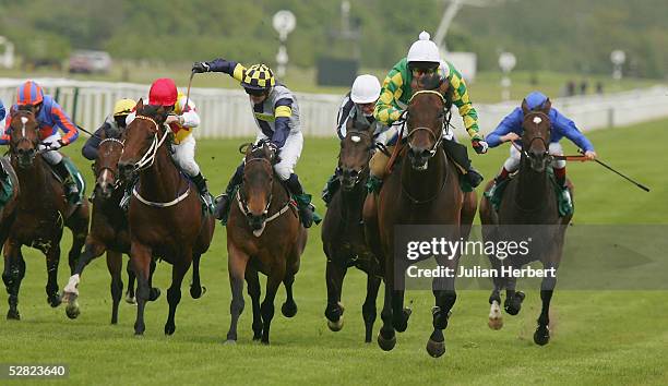 Philip Robinson and Rakti lead the field home to land The Juddmonte Lockinge Stakes Race run at Newbury Racecourse on May 14, 2005 in Newbury,...