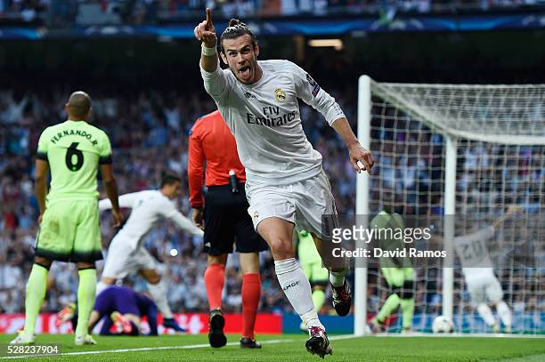 Gareth Bale of Real Madrid celebrates scoring the opening goal during the UEFA Champions League semi final, second leg match between Real Madrid and...