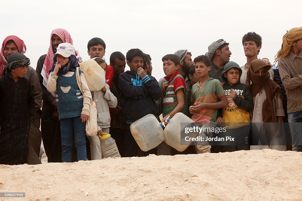 Syrian Refugees Cross Into Jordan