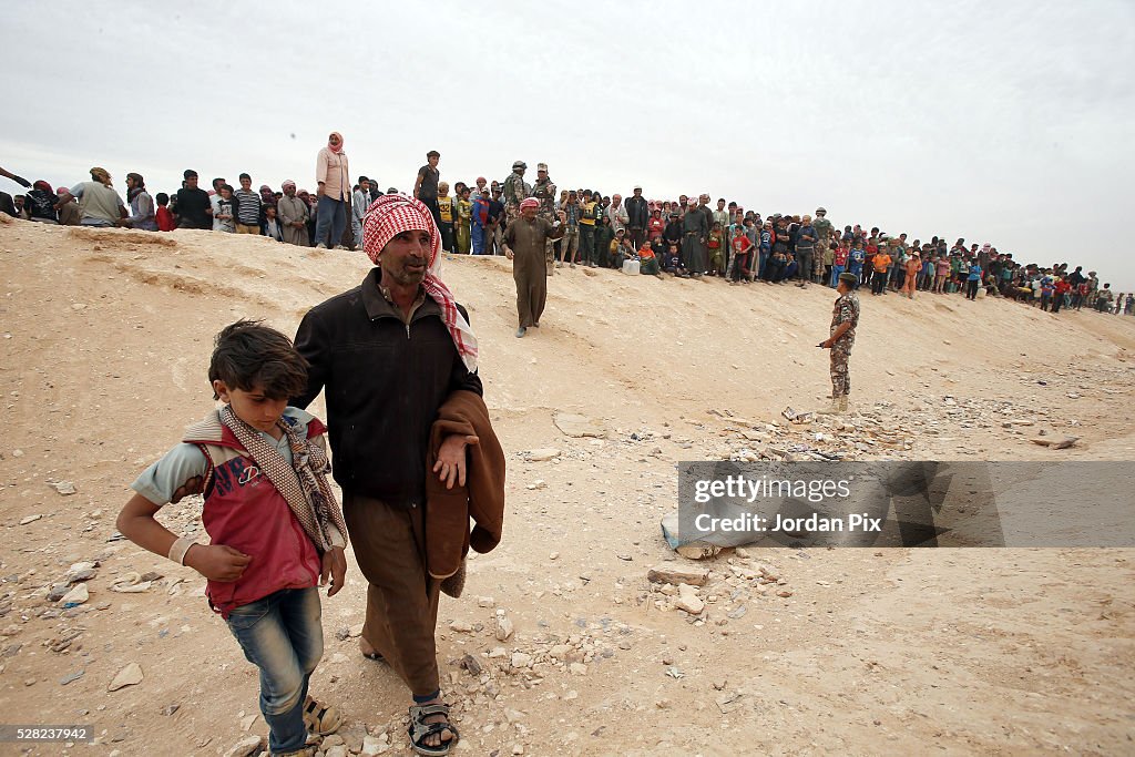 Syrian Refugees Cross Into Jordan