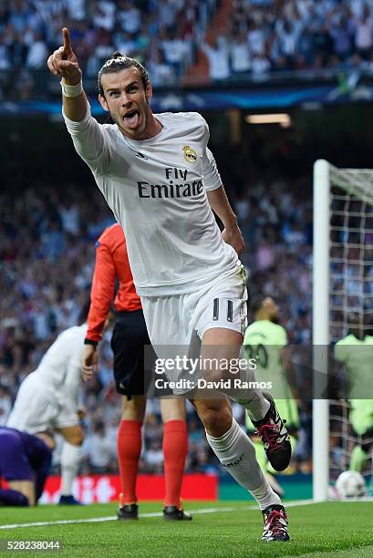 Gareth Bale of Real Madrid celebrates scoring the opening goal during the UEFA Champions League semi final, second leg match between Real Madrid and...