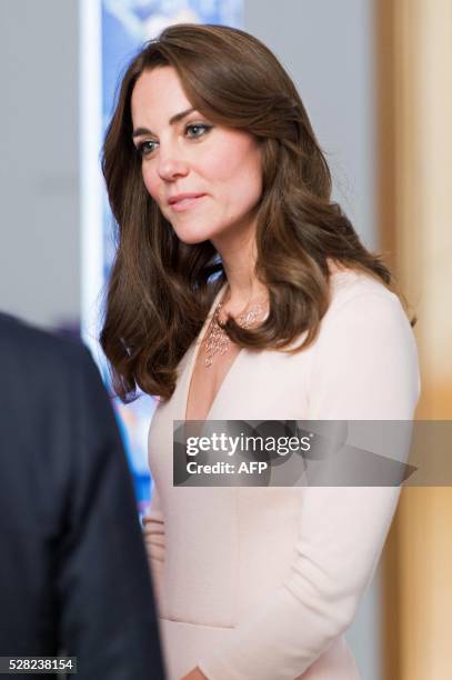 Britain's Catherine, Duchess of Cambridge, visits the "Vogue 100: A Century of Style" exhibition at the National Portrait Gallery in central London...