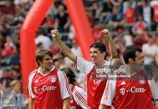 Roy Makaay and Sebastian Deisler of Bayern celebrate a goal during the Bundesliga match between FC Bayern Munich and 1.FC Nuremberg at the Olympic...