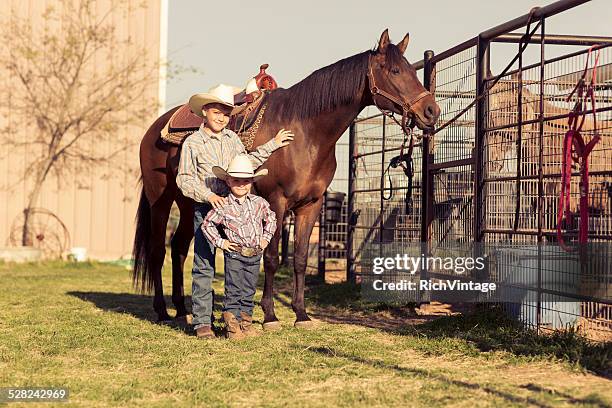 young male ranchers - west texas stock pictures, royalty-free photos & images