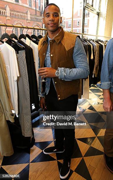 Reggie Yates attends Ami Mayfair Store Opening on May 4, 2016 in London, England.
