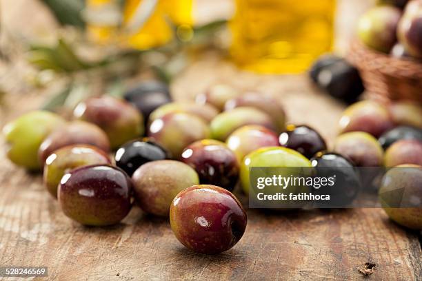 raw olives - extra virgin olive oil stock pictures, royalty-free photos & images