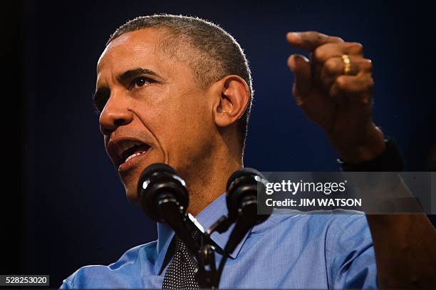President Barack Obama speaks at Flint Northwestern High School in Flint, Michigan, May 4, 2016 after meeting with locals for a neighborhood...