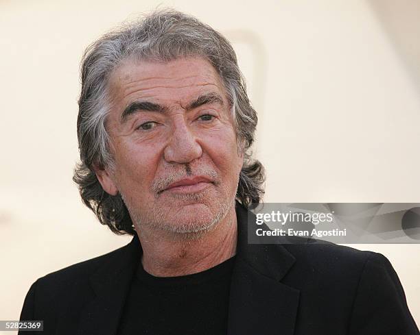 Designer Roberto Cavalli attends a photocall promoting the film "The DeCameron" at the The Yacht Satine during the 58th International Cannes Film...