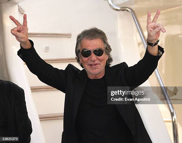 Designer Roberto Cavalli attends a photocall promoting the film "The DeCameron" at the The Yacht Satine during the 58th International Cannes Film...