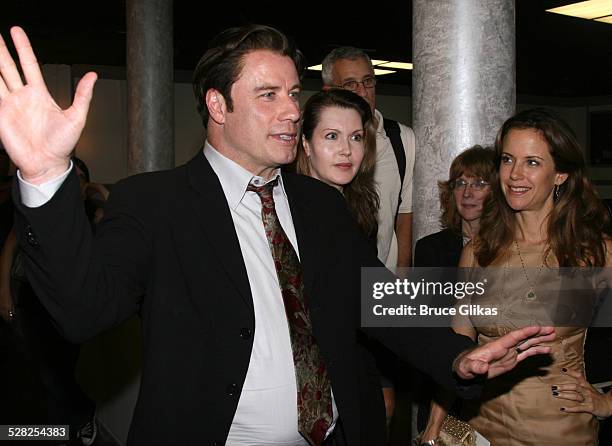 Actor John Travolta talks to the cast with playwright Myra Bairstow, director Pamela Hall, actor Mark Lamura and Kelly Preston when he visits The...