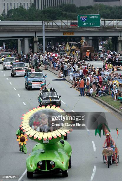 "The Sunflower Car" rolls out of downtown during the Everyone's Art Car Parade May 14, 2005 in Houston, Texas. The parade includes around 280 cars...
