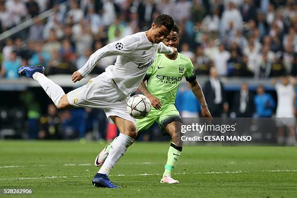 Real Madrid's Portuguese forward Cristiano Ronaldo prepares to shoot a ball during the UEFA Champions League semi-final first leg football match Club...