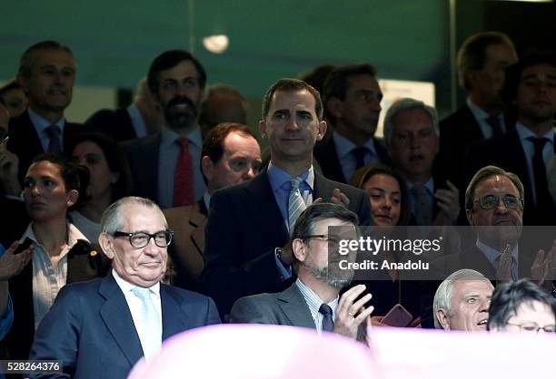 Felipe VI of Spain watches the UEFA Champions League semi-final second leg football match between Real Madrid and Manchester City at the Santiago...