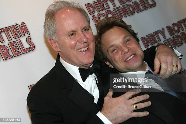John Lithgow and Norbert Leo Butz during Opening Night Curtain Call and Party for Dirty Rotten Scoundrels on Broadway at Imperial Theater thenThe...